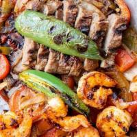 Fajita Beef & Shrimp For 2 · Marinated and grilled Shrimp & Certified Angus Beef, served with caramelized onions and gree...