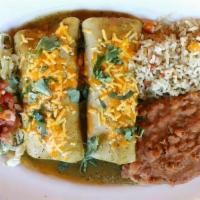 Enchiladas Pork · Slow-roasted chipotle pork, cilantro and onion, your choice of sauce: chile verde, green chi...