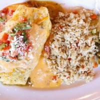 Burrito Refried Beans · Flour tortilla stuffed with refried beans, Monterey Jack and cheddar cheeses and your choice...
