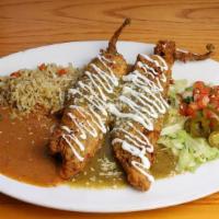 Rellenos Chicken · Two fire-roasted, stuffed, breaded and fried Anaheim peppers with hand-pulled chicken and Mo...