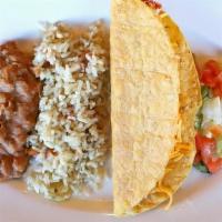 Kid Taco Crispy · Crispy corn shell filled with your choice of hand-pulled chicken or ground sirloin, lettuce,...