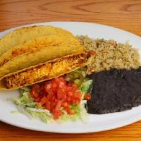 Tacos Crispy [Vegetarian] · Three crispy corn tortilla shells with lettuce, cheddar cheese, tomato and pickled jalapeño....
