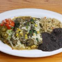 Enchiladas Grilled Veggie · Two blue corn tortillas rolled with fire-roasted chile, corn, grilled onion, zucchini, yello...