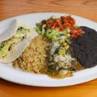 Combination Antonio · Grilled Veggie Enchilada with chile verde sauce and a Veggie Taco. Served with mashed black ...