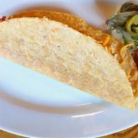 Ala Carte Taco Crispy · Ala Carte Taco on  Homemade flour tortillas with seasoned ground beef, lettuce, cheddar chee...