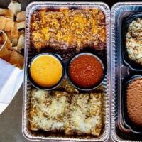 Roja Family Enchilada Meal For 6 · Enchiladas for 6 (12 enchiladas). Choose your protein and sauce.  All meals served with chip...