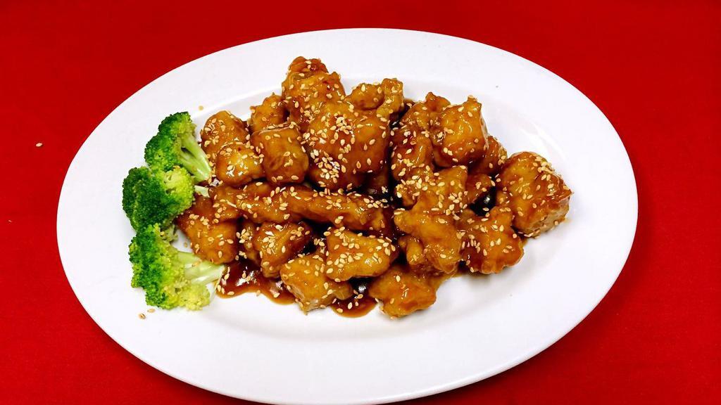 Sesame Chicken · Chunks of chicken sautéed with chef's sauce, topped with sesame seeds.