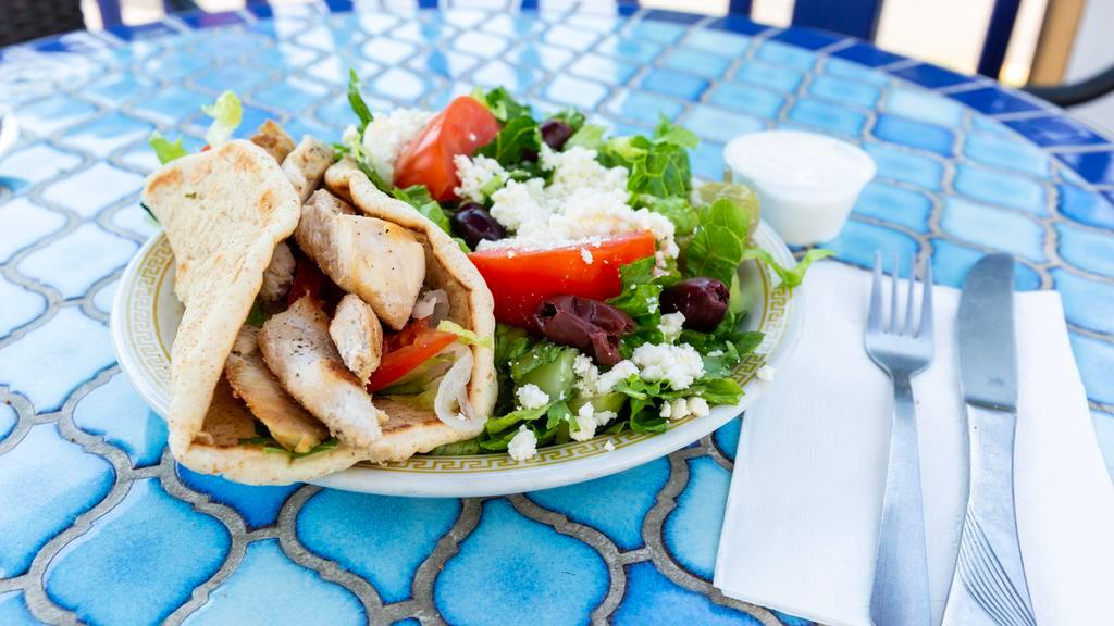 Chicken Gyro (Deluxe) · Grilled chicken breast filets, with lettuce tomatoes, onions and cucumber sauce wrapped in toasted pita bread.