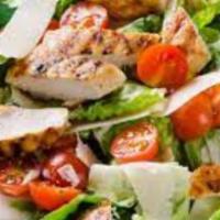 Grilled Chicken Salad · Grilled chicken breast served on a bed of romaine lettuce with tomatoes, olives, feta cheese...