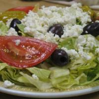 Greek Salad Small · Romaine lettuce topped with tomato, peppers, olives, feta cheese, and our house wine vinegar...