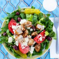 Souvlaki Salad · Grilled pork tenderloin over a bed of romaine lettuce with tomatoes, olives, feta cheese, pe...