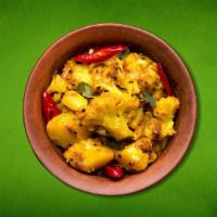 Savory Potato & Cauliflower (Vegan) · Cauliflower and potatoes cooked to perfection with mild Indian spices along with ginger, tom...