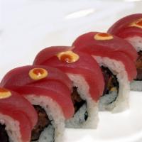Kiss Of Fire Roll · Spicy tuna and cucumber topped with tuna and spicy mayo, hot sauced
