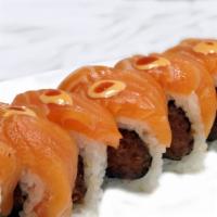 King Salmon Roll · Spicy tuna and cucumber topped with salmon and spicy mayo, hot sauced