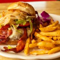 Chipotle Burger · Seven ounce fresh angus ground beef, bacon, lettuce, tomatoes,caramelized onions, chipotle m...