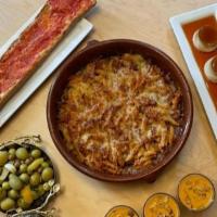 Menu Del Dia De Macarones · This feast serves up to four and features: Macarrones con chorizo, Olivas, 4 Vasos de Gazpac...