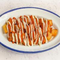 Patatas Bravas · Fried potatoes with spicy tomato sauce and garlic alioli