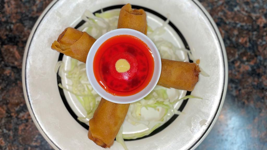 Chao'S Spring Rolls · 2 pieces. Served with sweet and sour and hot mustard.