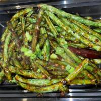 Szechwan Style String Beans · Spicy. Fresh string beans sauteed in chili-garlic sauce.
