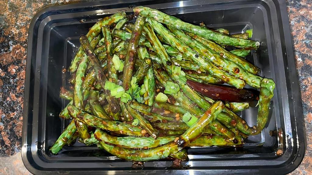 Szechwan Style String Beans · Spicy. Fresh string beans sauteed in chili-garlic sauce.