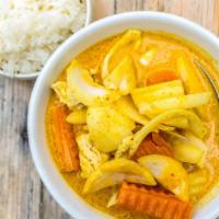 Yellow Curry · Favorite. Spicy. Yellow curry, coconut milk, potatoes, carrots and onions. Comes with jasmin...