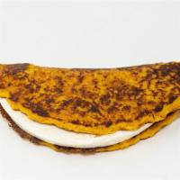 Cheese Cachapa · Venezuelan sweet corn cake served with queso de mano.
