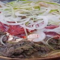 Yet Nal Bulgogi · Thin Slices of marinated tender beef rib eye with glass noodles.
serve with rice, side dishe...