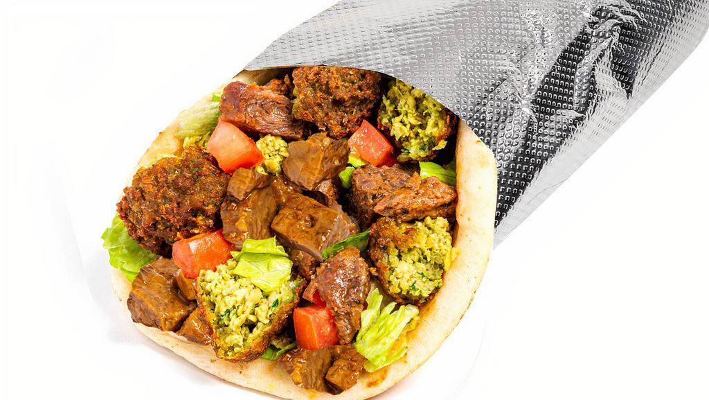Savory Herb Beef & Falafel Sandwich · Tender, seared sirloin marinated in a Savory spice blend with crispy falafel served in a warm pita with your choice of additional toppings