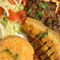 Tipico  Montanero · grill chicken,steak,and chicharron, served with rice,beans,and salad