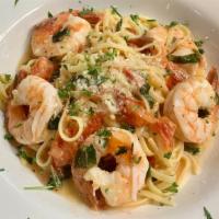 Shrimp Scampi Pasta · shrimp scampi,tomatos,garlic, butter, white wine, parsley, basil,parmesan cheese, over lingu...
