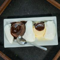 Lava Cake With Ice Cream · Warm chocolate cake, chocolate filling with vanilla ice cream.