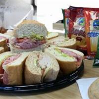 Office Hero Meal · Medium Sub Tray, 5 chips, 5 cookies, and a gallon tote of your favorite beverage with cups. ...