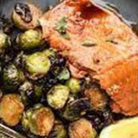 Scottish Salmon Or Red Snapper · Served with garlic potatoes, sauteed mushrooms & Brussels sprouts.