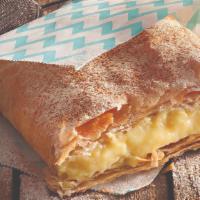 Bougatsa · Mouthwatering creamy custard wrapped in golden brown crispy phyllo. Served warm.