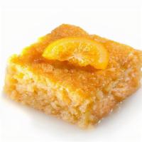 Orange Cake · A refreshing orange flavored cake sweetened with a honey and orange zest syrup.