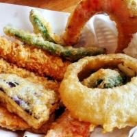 Shrimp Tempura Appetizer · Shrimp lightly dipped in delicate batter & fried.