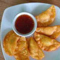 Fried Wonton 7Pcs · Ground chicken wrapped in wonton skin, served with sweet chili sauce.