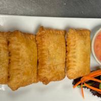 Curry Puff 4 Pcs · Deep-fried pastry shell stuffed with curried veggies, carrots, and potatoes.
