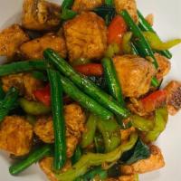 Salmon Kra Pao · Medium Spicy. Sautéed crispy salmon with string bean, green pepper, red bell pepper, and bas...