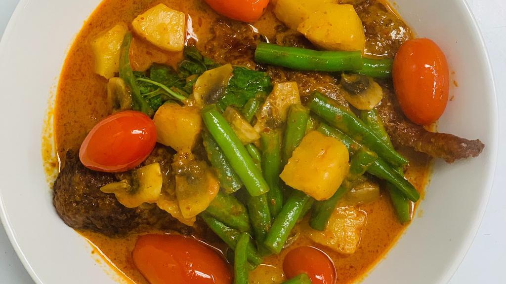 Duck Pineapple Curry · Mild Spicy. Basil, tomato, mushroom, pineapple, and string bean.