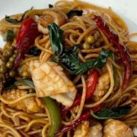 Spaghetti Kee Mao · Mild Spicy. Stir-fried spaghetti, basil, string beans, onions, roasted chilies, and fresh pe...