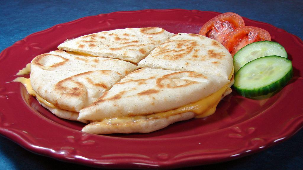Grilled Cheese Sandwich · Pita bread and American Cheese.