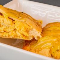 Peruvian Empanadas · Homemade pastry-style dough stuffed with our house fillings and baked daily.