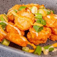 Tater Tot Crowns · Tater tot crowns covered in your choice of chipotle aioli or Peruvian aioli with rocoto, and...