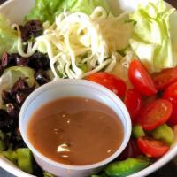 Side Salads · Your choice of greens, one cheese, three veggies and your choice of dressings.