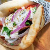 Lamb-Beef Gyro · Wrapped in greek pita with tzatziki, tomato and onion