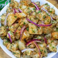 Medi Potatoes  · Potatoes mixed with red onions, herbs and drizzled with our olive oil house dressing, a heal...