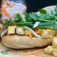 Tofu Banh Mi · Lemongrass seasoned tofu on a buttered/margarine toasted 9 inch french bread with tofu and p...