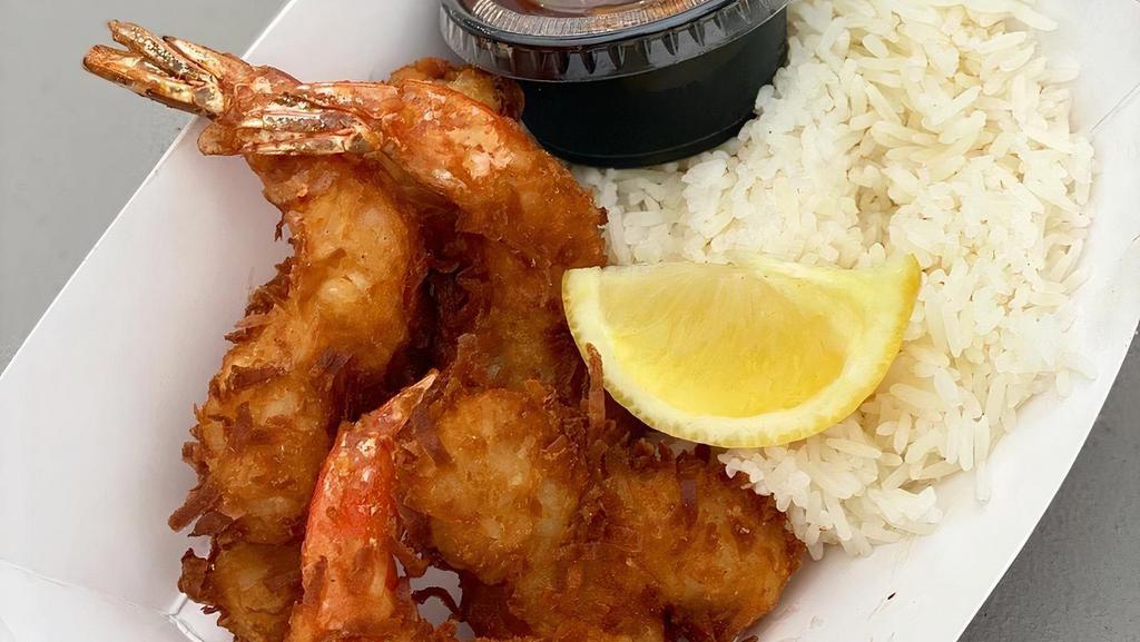 Coconut Shrimp · Most popular. Shrimp coated in our house-made shredded coconut batter, deep-fried golden and crispy, served with jasmine rice & sweet chili dipping sauce.
