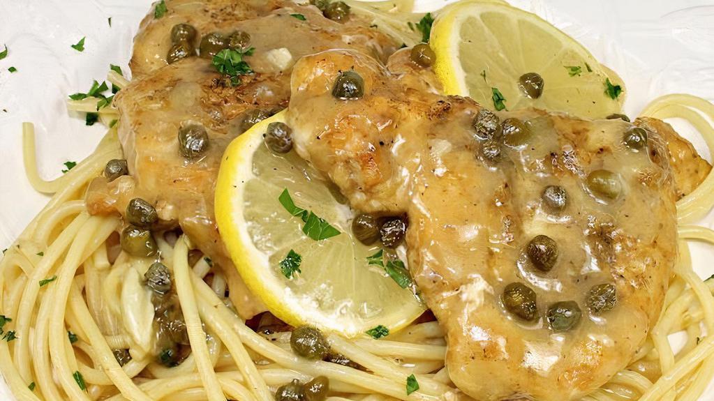 Veal Picatta · Veal scaloppini sautéed in lemon-butter sauce with capers.